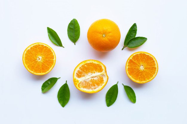 high vitamin c fresh orange citrus fruit with leaves isolated white